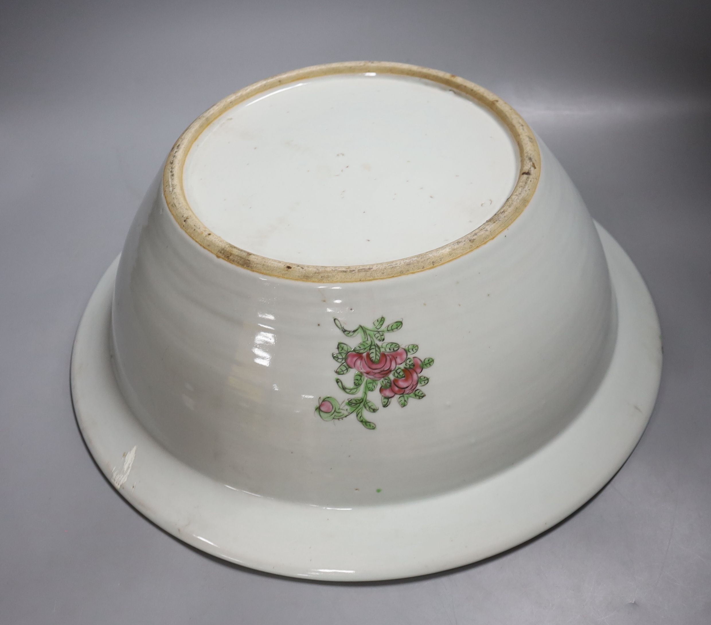 A 19th century Chinese famille rose water bottle with cover and basin, water bottle and cover 39 cms high.